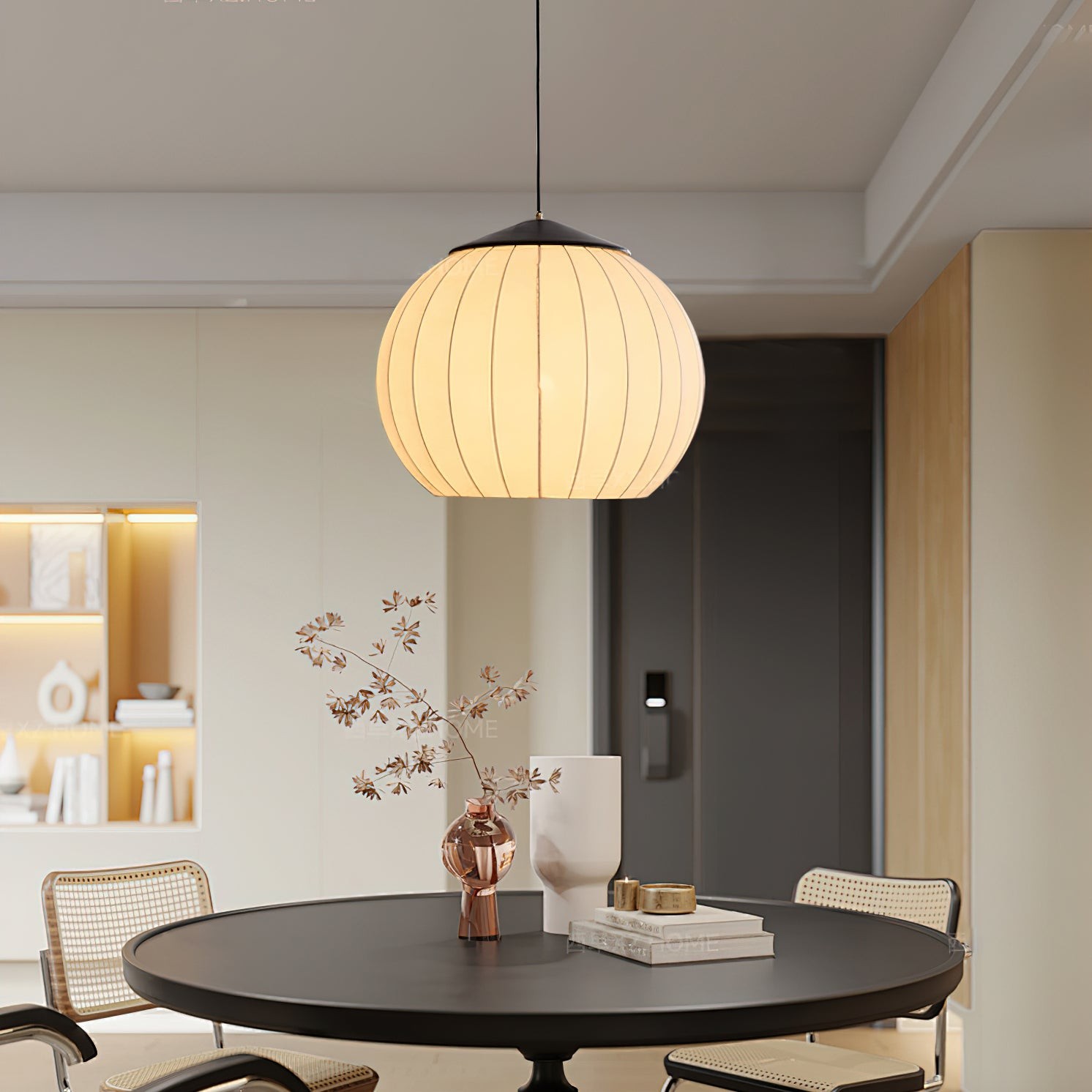 Glowing lantern pendant centered above a dining area