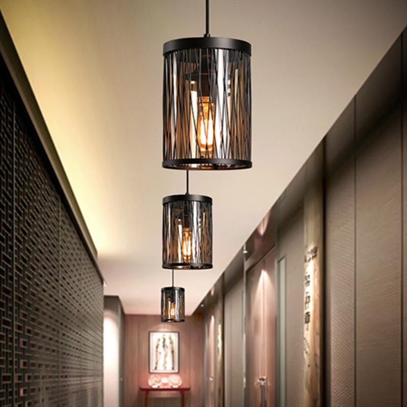 NETTENY caged pendant lights installed in a hallway