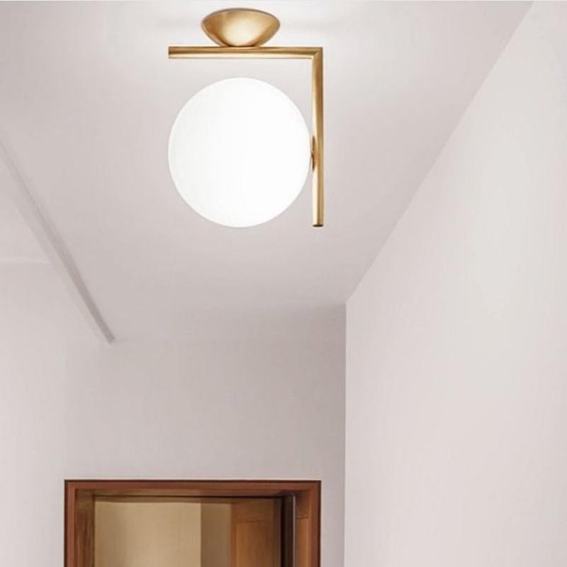 Glass globe light installed as a ceiling light in a hallway