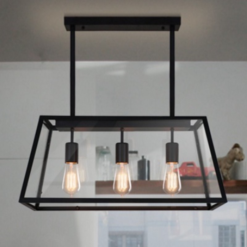 Close room view of the Vintage REXAM three-bulb hanging light