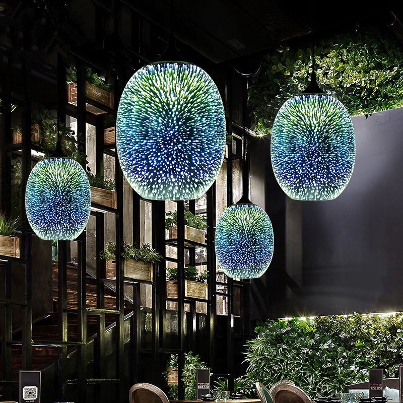 Colorful pendant lamps in a moody restaurant-like interior