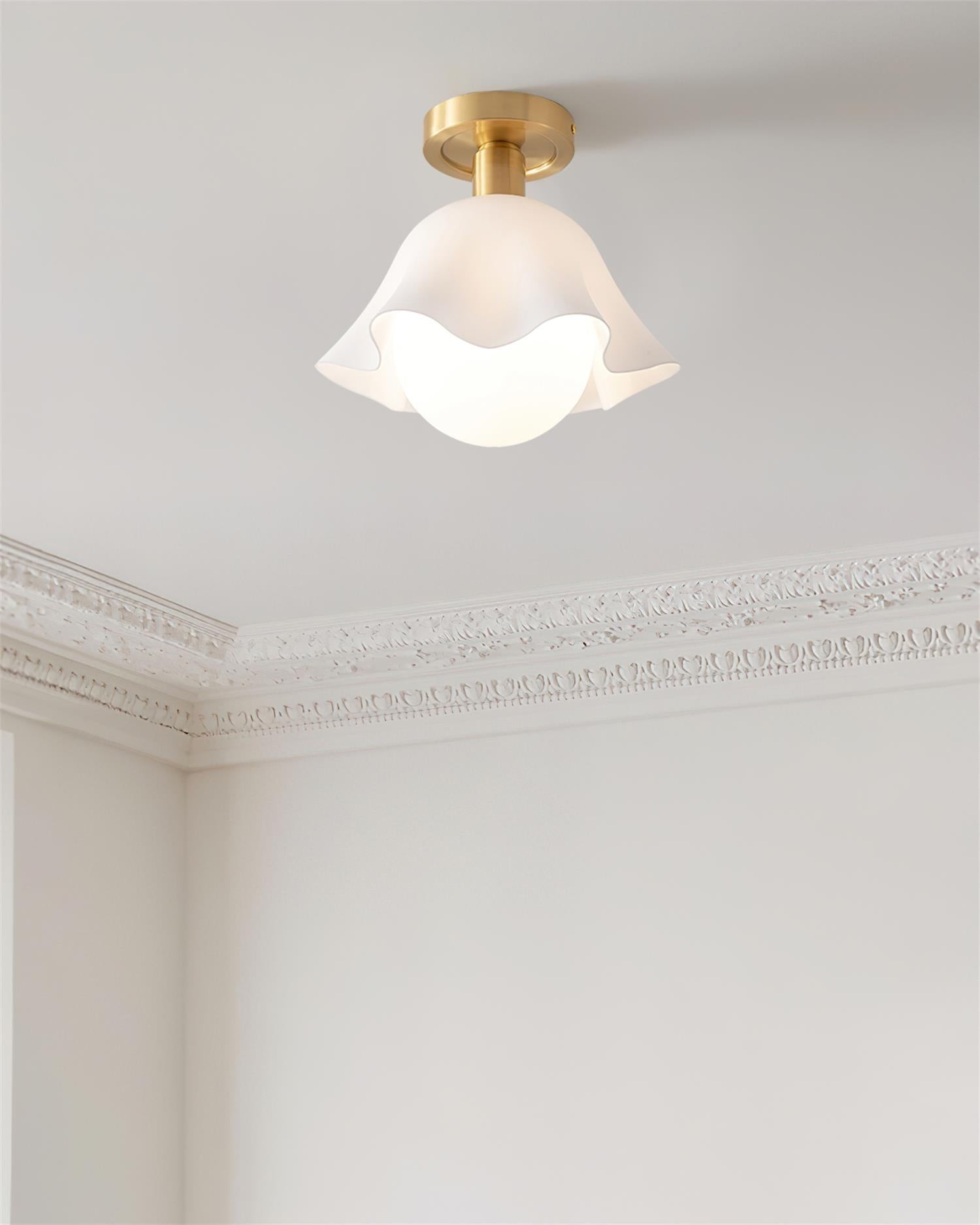 French Flower Ceiling Light installed near decorative ceiling molding