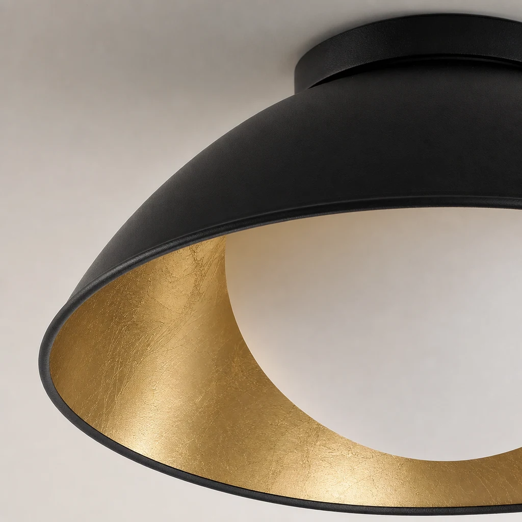 Close-up detail of the black, white, and gold metal and glass ceiling light finish