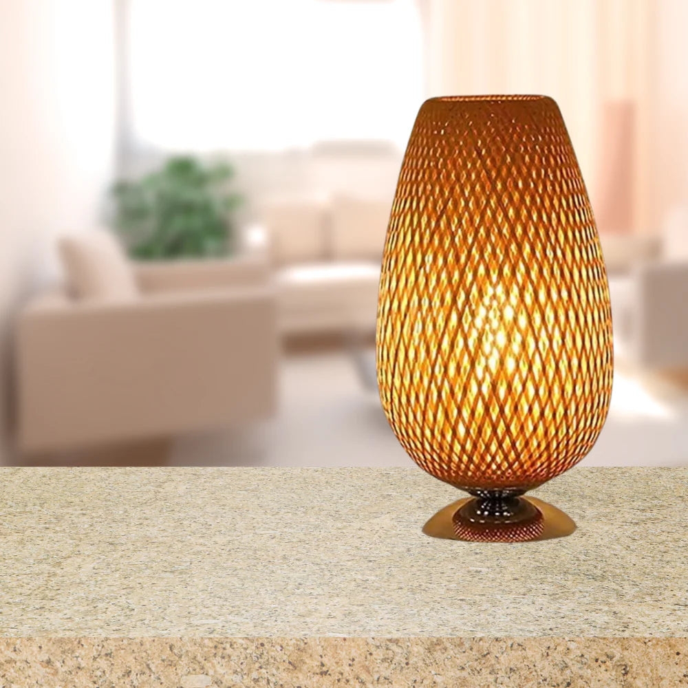 Bamboo lamp on a tabletop with a softly blurred living-room background