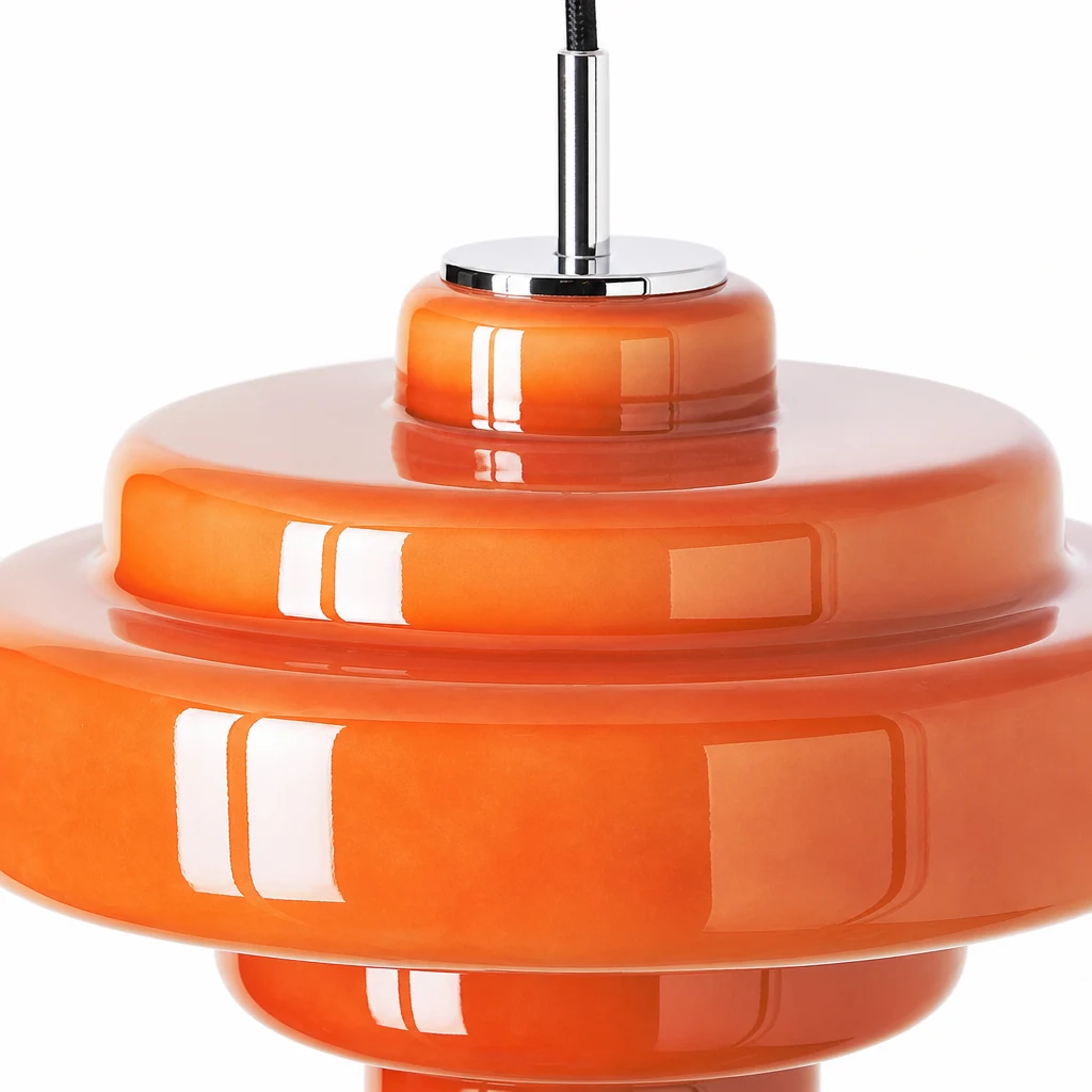 Close-up of Koloro pendant fluted glass shade and metal detail