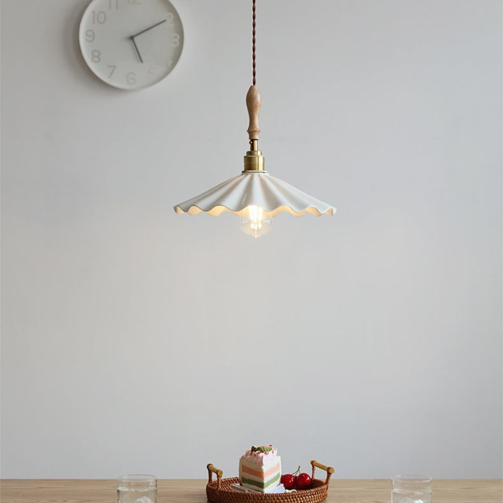 Ceramic Flute Pendant Lamp displayed above a table scene