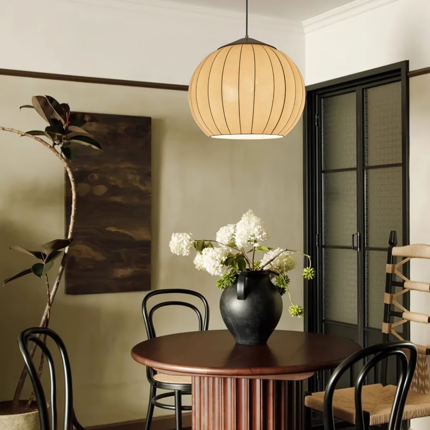 Lantern pendant lamp above a dining nook