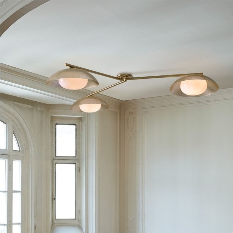 Lit Elorina flush mount ceiling light creating a warm glow