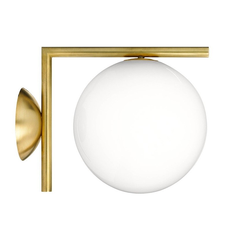 Brass finish glass globe wall and ceiling light isolated product view