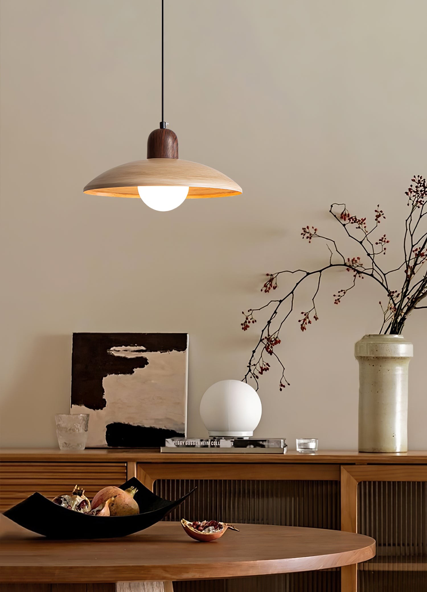 Pendant lamp over a table with interior decor