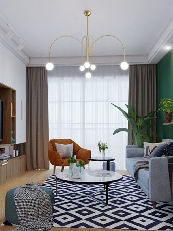 Mosiężna lampa wisząca Gran Finale w scenie pokojowej