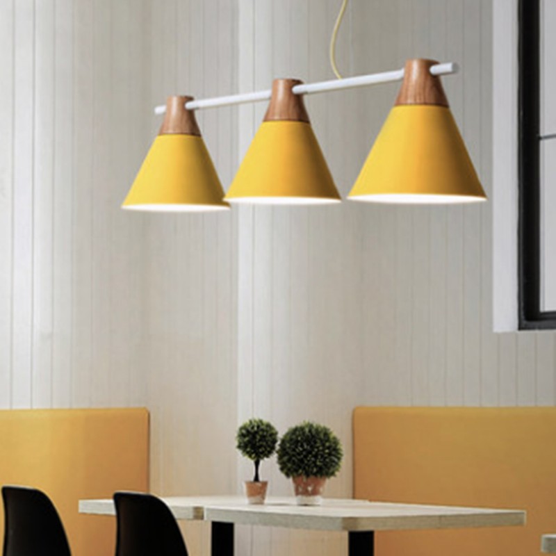 Yellow GRENNER Pole Pendant Light in a dining space