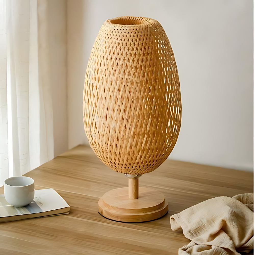 Bamboo table lamp on a tabletop near a window