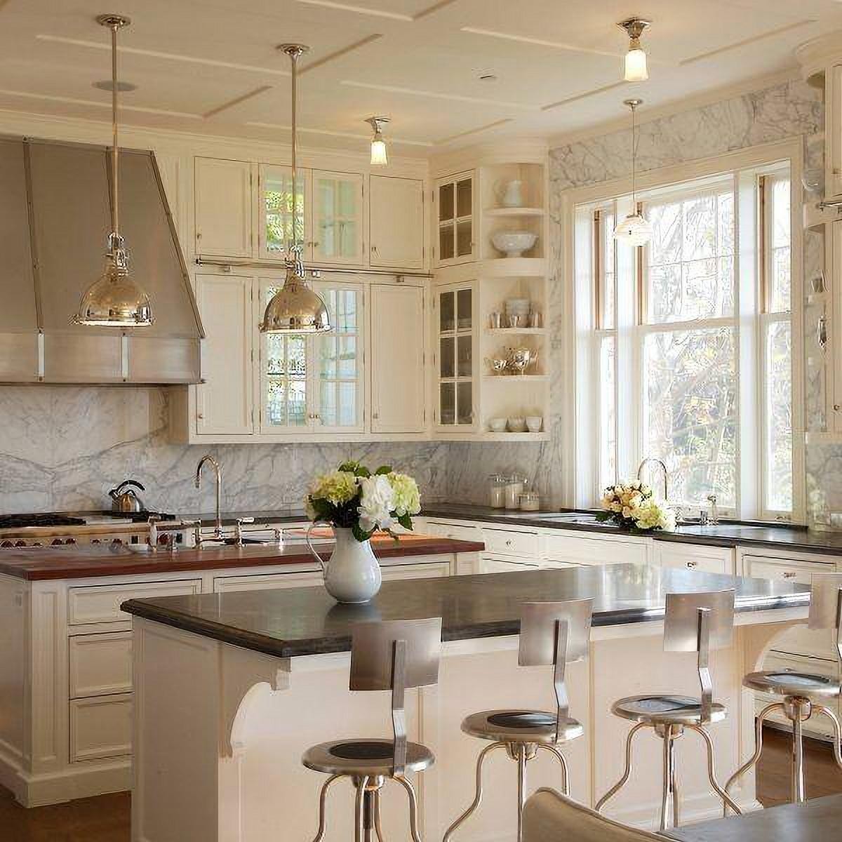 Kitchen scene with pendant lights over an island