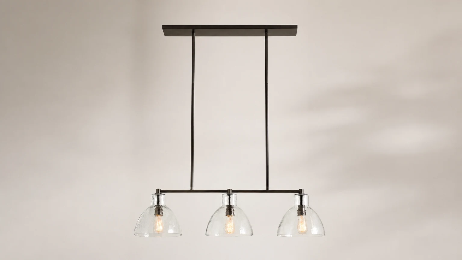 Glavira linear chandelier shown in an interior setting