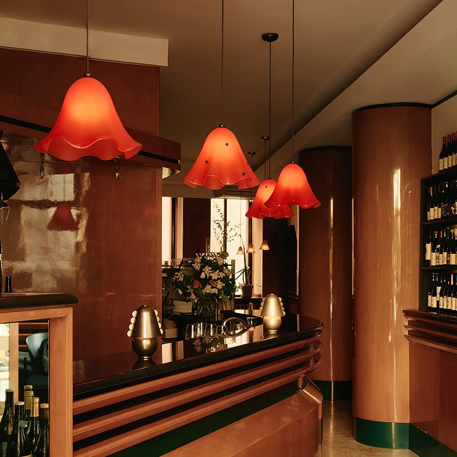 Multiple French Skirt Pendant Lamps in a restaurant bar interior