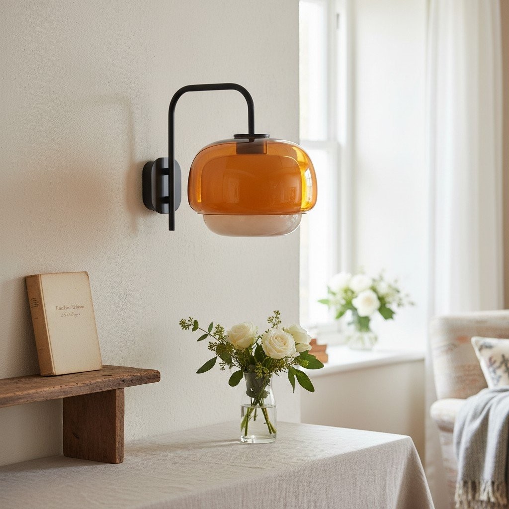 Clinco colored glass wall lamp installed above a table with flowers