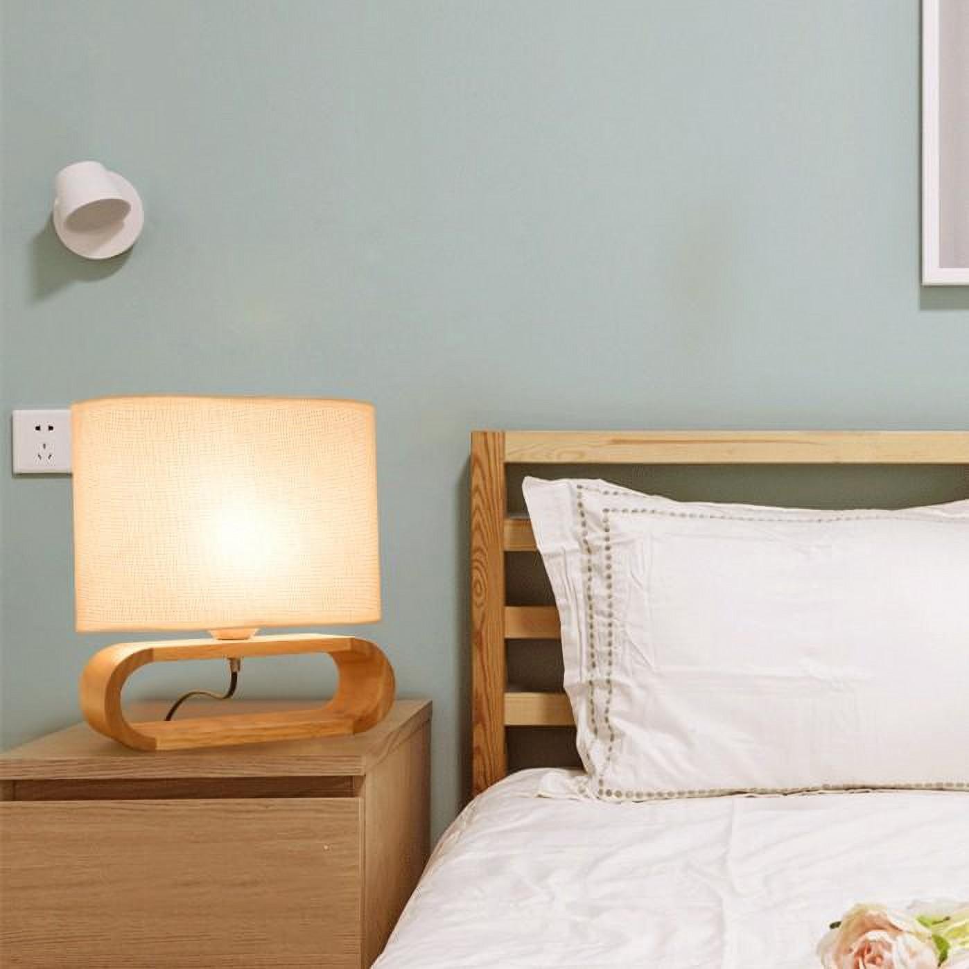 Wooden table light on a bedroom nightstand
