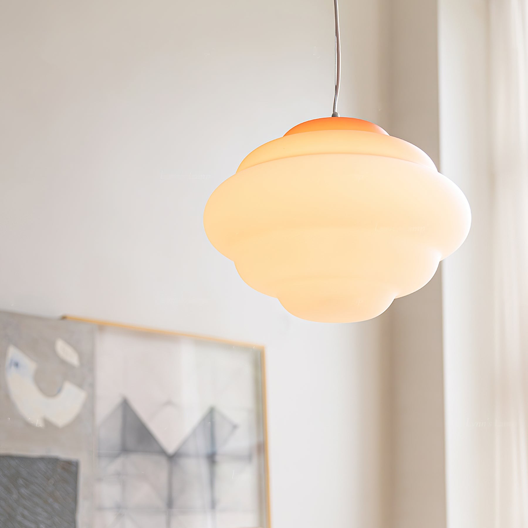 Close lifestyle view of glowing gradient pendant lamp