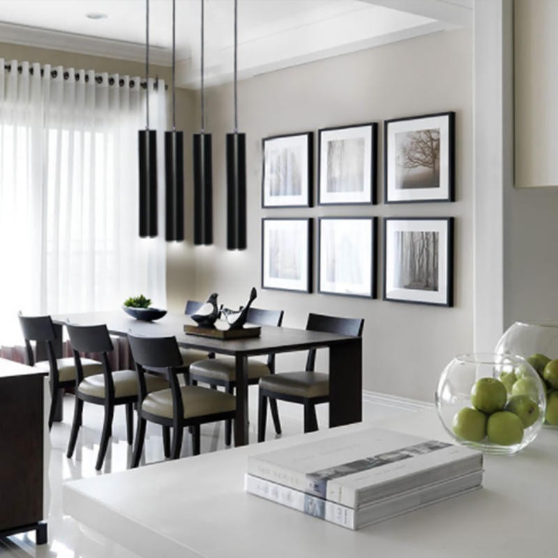 Pendant lamps above a dining table