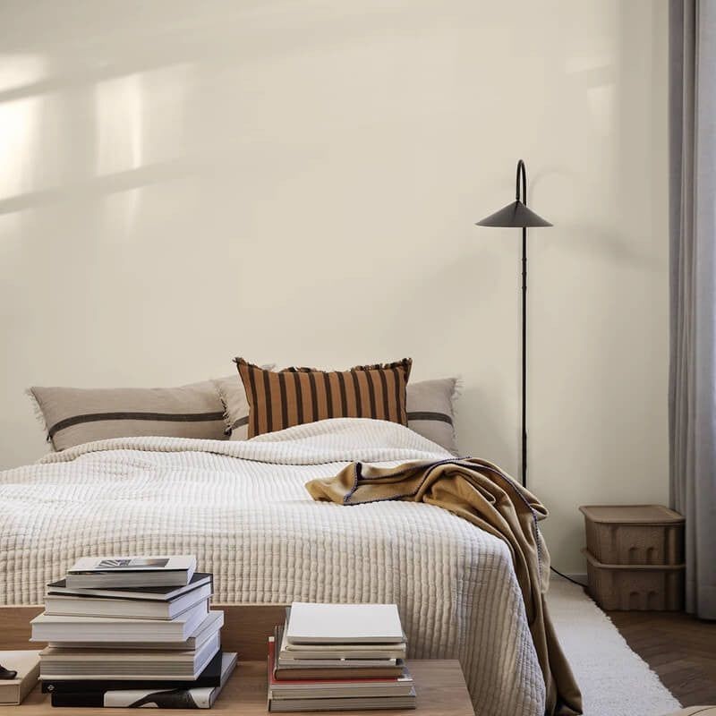 Black wall lamp in a bedroom lifestyle setting