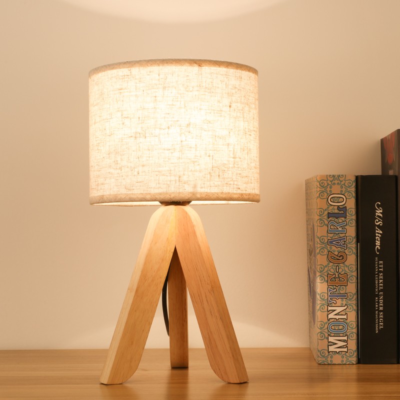 Minimalist Wooden Table Light on a tabletop with books