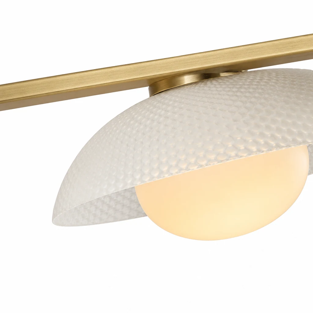 Close-up detail of the Elorina ceiling light textured disc and metal finish